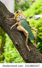 Grasshopper As A Yard Toy