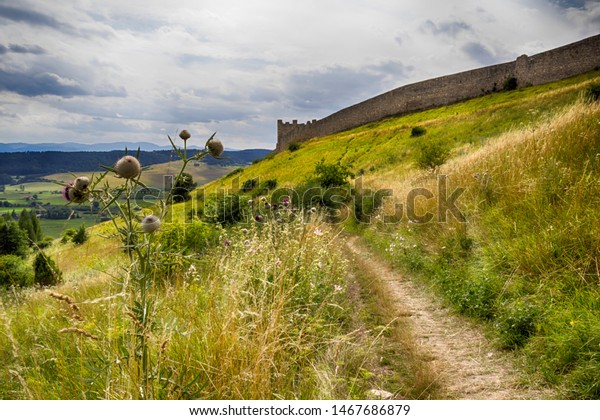 Grassy Path Through Hills Around Medieval Stock Photo Edit Now