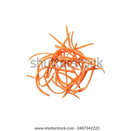 grated carrots on a white background