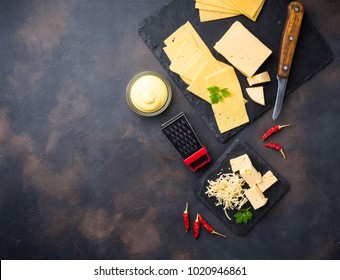 Grated Cheese On Slate Board. Top View