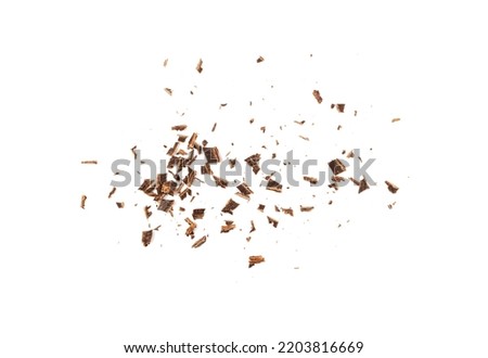Grated chocolate pile isolated. Crushed chocolate shavings, crumbs, scattered flakes, cocoa sprinkles for desserts decoration on white background