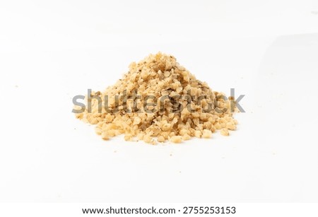 Grated wallnut , broken roasted walnuts powder, heap of chopped nuts crumbs, whole kernel pieces, fractions, powder top view on white background