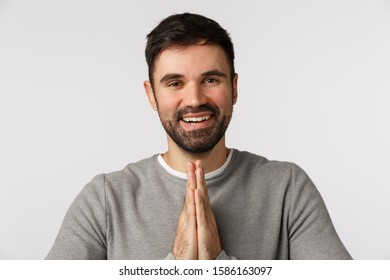 Grateful Pleased Good-looking Bearded Man Express Gratitude And Pleasure Meet Someone, Bow Politely With Hands Press Together, Make Pray Gesture Thanking For Help, Smiling Delighted, White Background