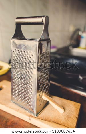 Grater with cheese