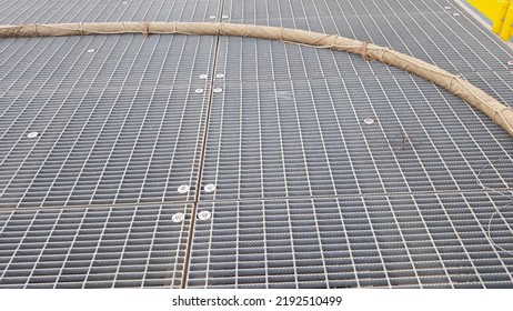 grating on structural surfaces that are ready for loadout