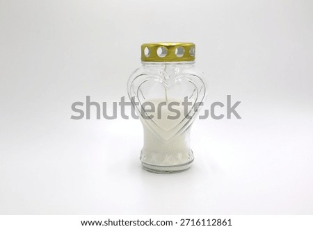 Grave lantern with candle inside on white background