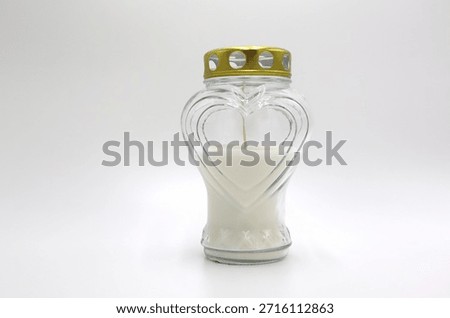 Grave lantern with candle inside on white background