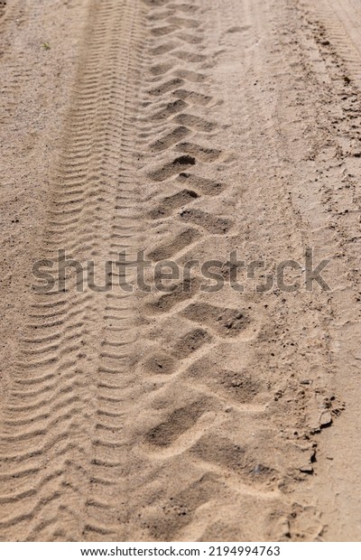 Gravel highway in rural areas , a simple\
primitive road for the movement of\
cars