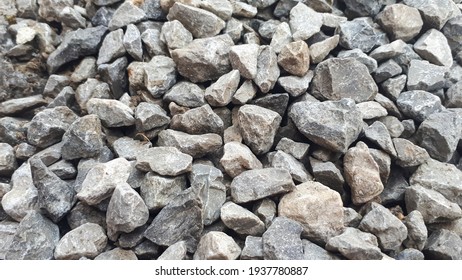 Gravel outdoor  road. Closeup gravel texture. Stone pattern. Small rocks ground