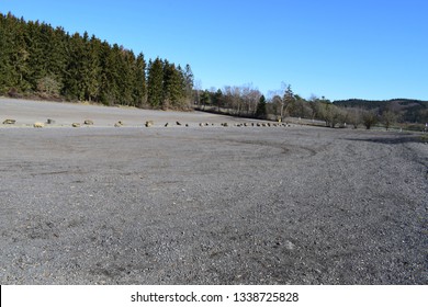 gravel parking lot - Shutterstock ID 1338725828