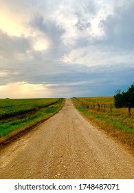 Gravel road in Kansas on a cloudy day