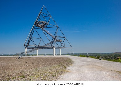 Gravel road leading to the tetrahedron structure in Bottrop, Germany