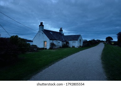 Gravel Road Near The Old Traditional Country House At Night. People Are Staying Home After Coronavirus (COVID 19) Outbreak. Crinan, Argyll And Bute, Scotland, UK