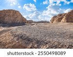 Gravel road platform and Yardang landform mountain natural landscape in Xinjiang, China. Outdoor natural background.