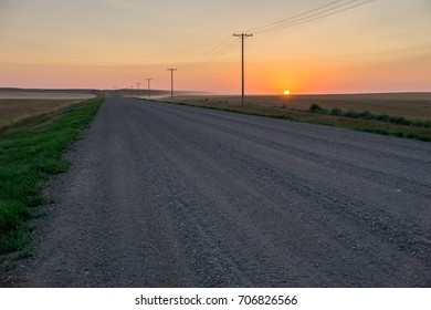 Gravel Road At Sunset In Saskatchewan, Canada.