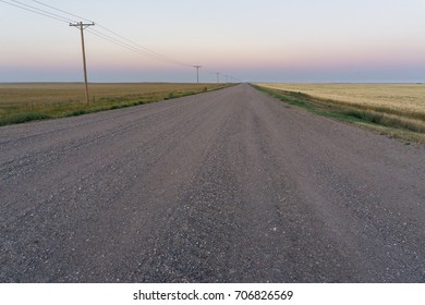 Gravel Road At Sunset In Saskatchewan, Canada.