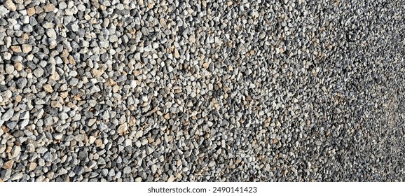 Gravel is small rock, usually crushed granite. The size of gravel that is always used is between 2 until 75 mm. Gravel is often used in the construction of roads, railway sleepers andmake a bricks.