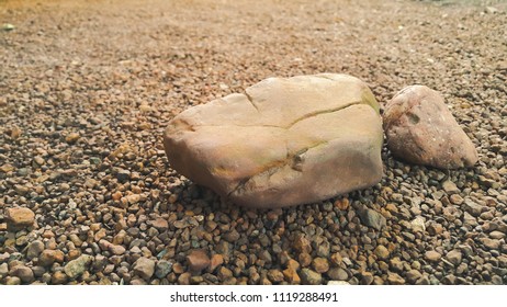 gravel stones different shape as floor texture background. Small rocks background texture, abstract stone texture pebbles.