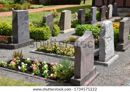 Graves in a well-kept village cemetery