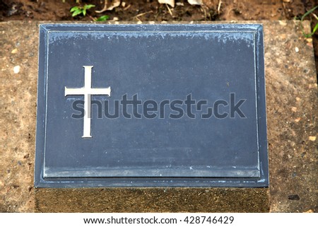 gravestone with copy space. 
write down your enemy name concept. 
write it yourself concept.