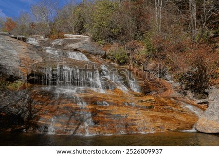 Graveyard fields lower falls along the Blue Ridge Parkway in North Carolina in Autumn