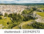 Gravina in Puglia, Apulia Bari, Italy: landscape from the ancient aqueduct bridge of the old rock church and the cave houses carved into the tuff rock