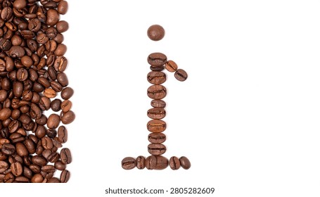 A gravity-defying, perfectly balanced architectural stack of roasted coffee beans forming a slender, elegant vertical tower.