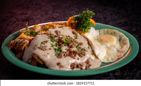 Gravy Smothered, Mouth Watering Chicken Fried Steak And Eggs.