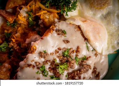 Gravy Smothered, Mouth Watering Chicken Fried Steak And Eggs.