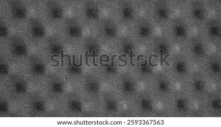 Gray acoustic foam panel with egg crate pattern, soundproofing material, isolated on white background.