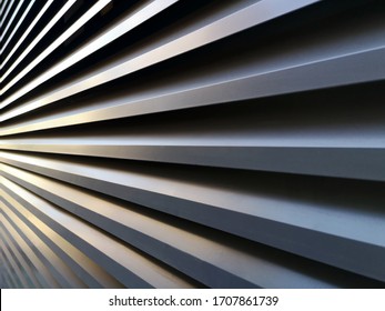 gray aluminium metal stripes converging