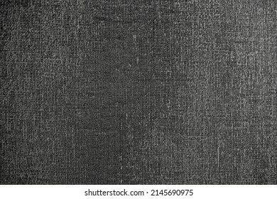 Gray background of decorative plaster with abstract spots. Unusual silver wall texture with beautiful patterns, creative surface background. Dressing coating for building cladding.