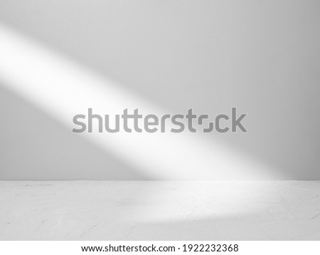 Gray background for product presentation with beam of light