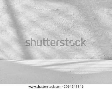 Gray background for product presentation with light from the window