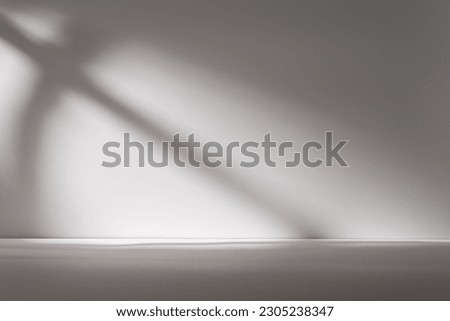 Gray background for product presentation with shadow and light from windows