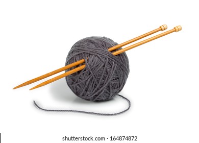 ball of yarn with knitting needles