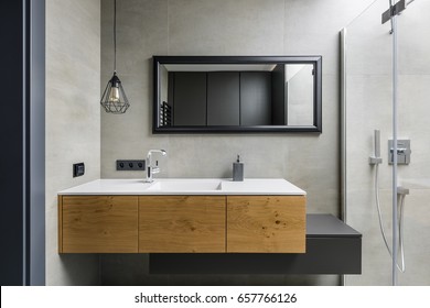 Gray Bathroom With Modern Countertop Basin, Mirror And Shower