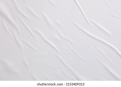 Gray beige crumpled wet craft paper blank texture copy space background.