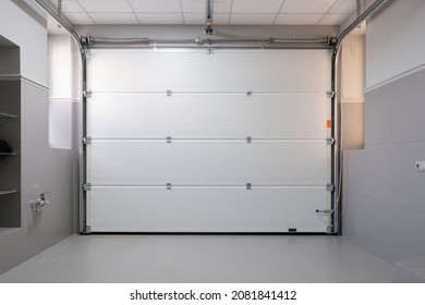 Gray And Beige Interior Of New And Clean Garage. Concept Of Real Estate Object.