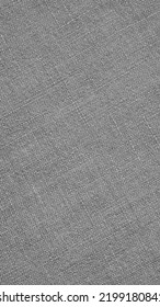 Gray Or Black And White Woven Surface Close Up. Linen Textile Texture. Fabric Handicraft Vertical Background. Textured Braided Grey Backdrop. Len Mobile Phone Wallpaper. Macro