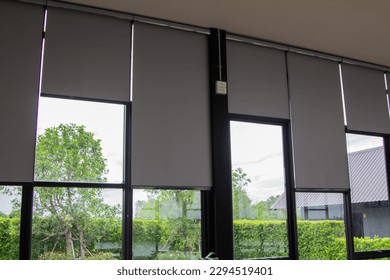Gray blind or curtains on the glass window
