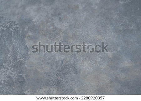 Gray blue brown beige abstract grunge background. Cracked concrete floor. Dusty blue color. Dirty rough surface texture. Old, damaged.