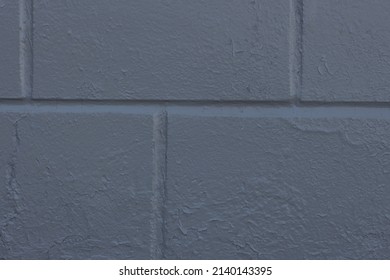 Gray brick wall is the background for a cozy interior of the house