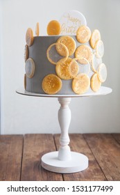 Gray Cake With Carmel Decoration
