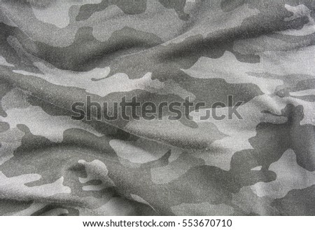Gray camouflage fabric texture background