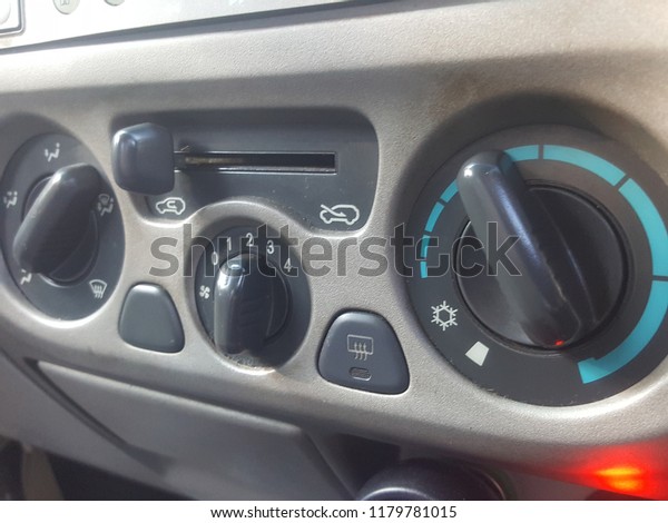 Gray Car Air Control\
Button