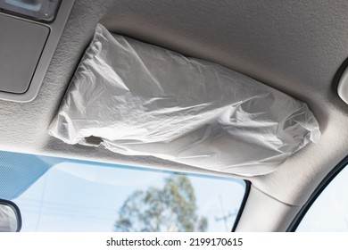 Gray Car Sun Visor With Plastic Wrap