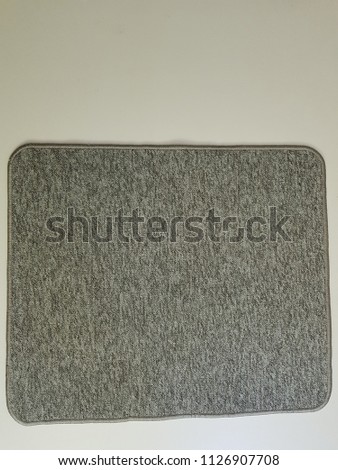 Gray carpet texture and background. Carpet pattern and design. Carpet wallpaper and abstract. Synthetic fabrics texture.