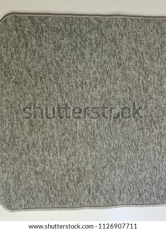 Gray carpet texture and background. Carpet pattern and design. Carpet wallpaper and abstract. Synthetic fabrics texture.