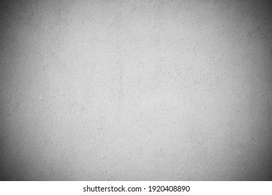 Gray cement adjusts the edges of the image for the background. White cement plastered concrete wall. Stucco painted concrete background wall plaster wall. White concrete surfaces for interior design.